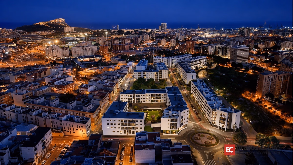 Aerial night view of modern apartment complex in Alicante