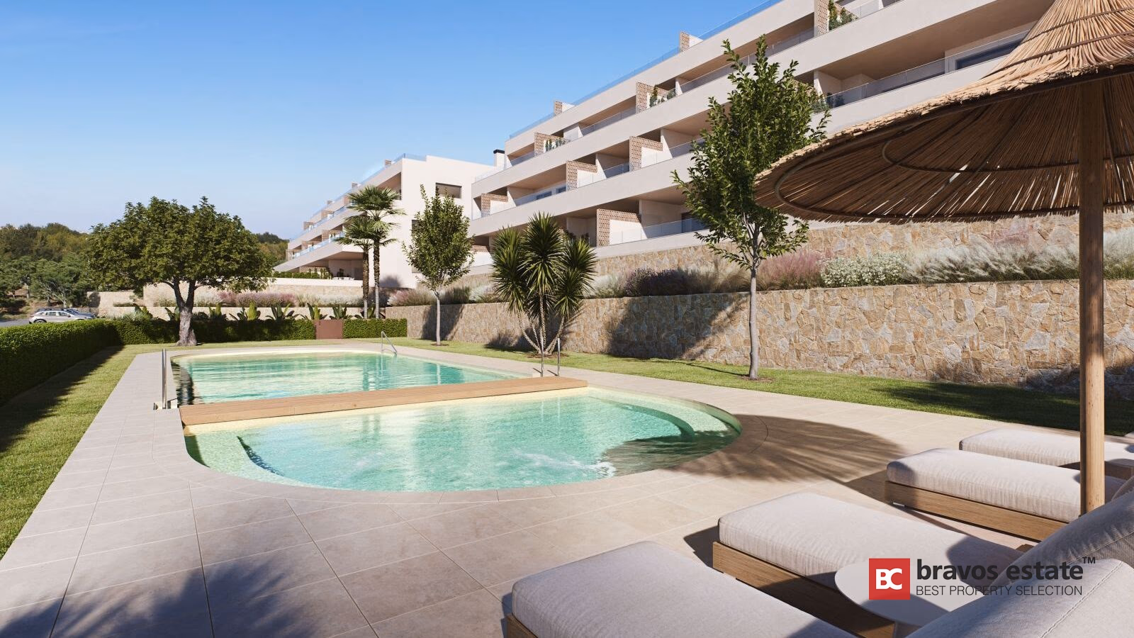 Communal pool with sunbeds and parasol, surrounded by apartment building and landscaped Mediterranean garden