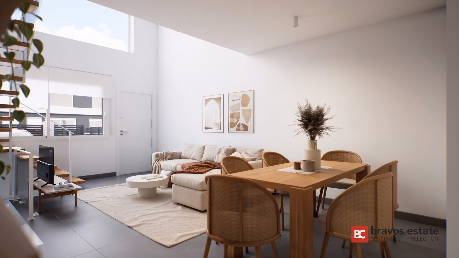 Open-plan living room with wooden dining table and clerestory windows in Gran Alacant townhouse