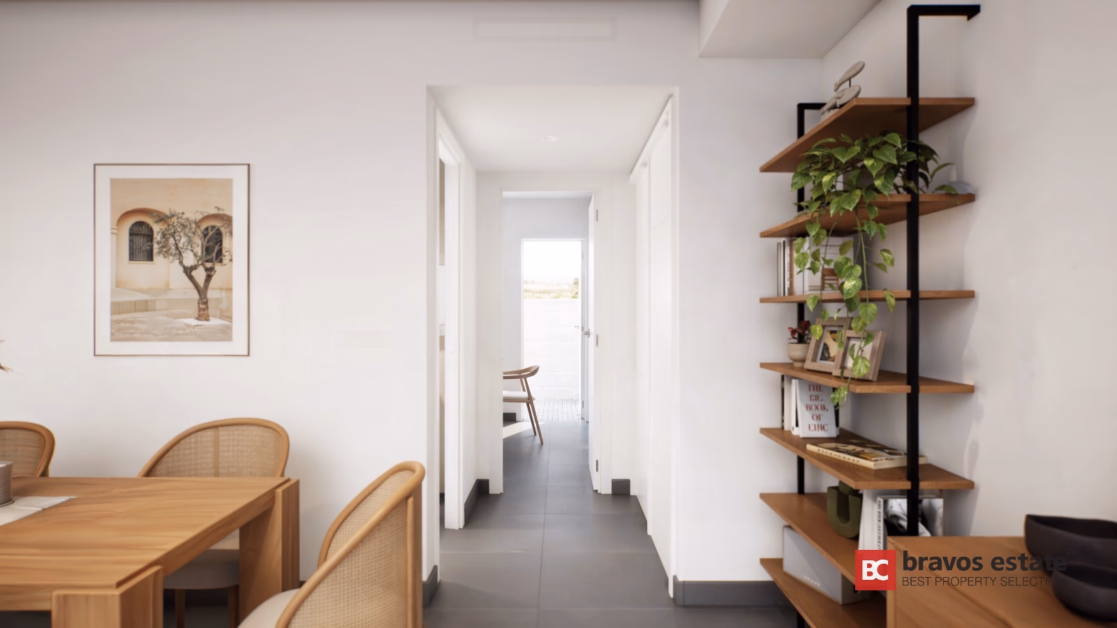 Bright dining area with wooden table, cane chairs and industrial bookshelf in Gran Alacant townhouse