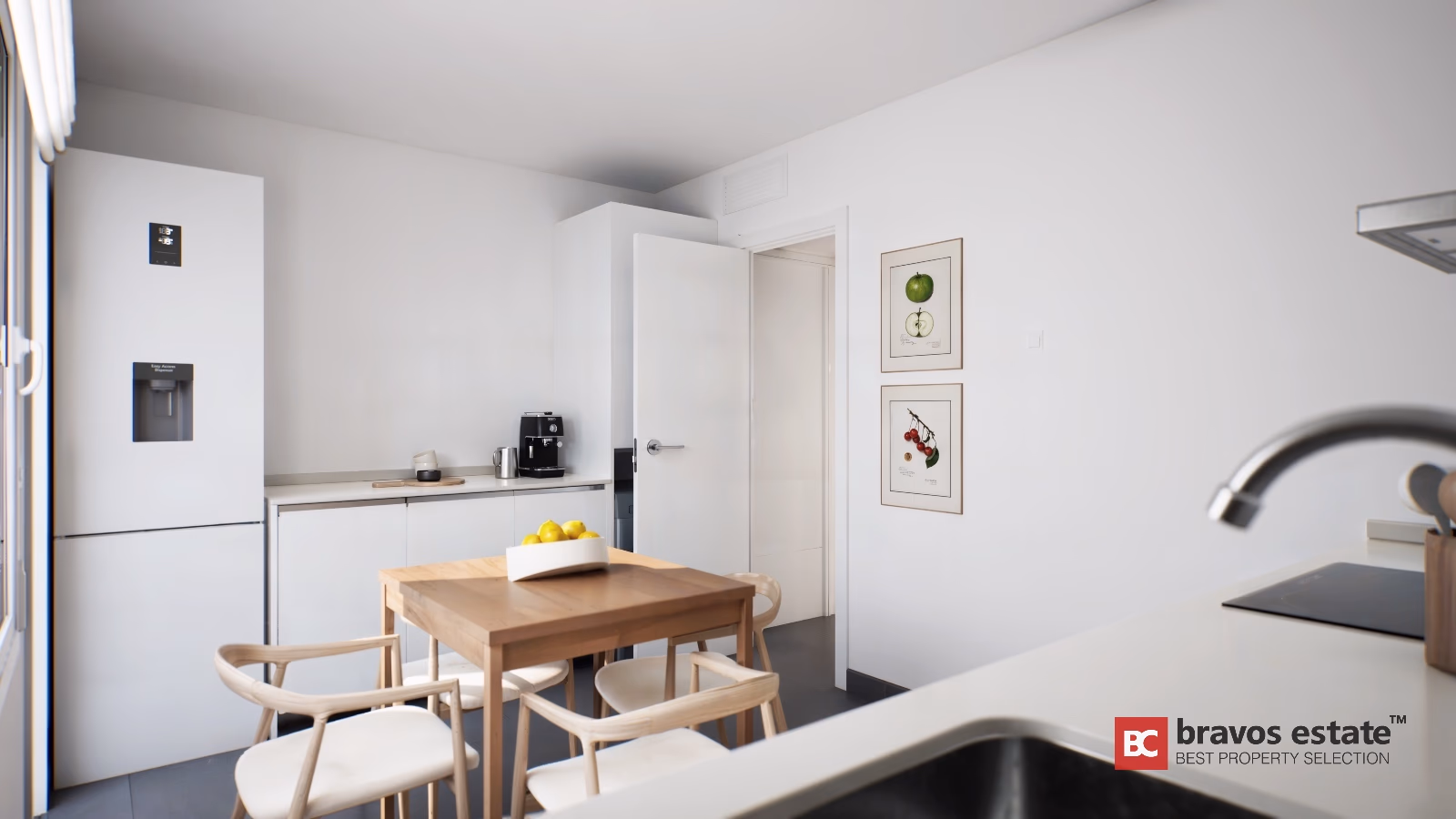 Bright open-plan kitchen and dining area with wood table, white appliances and botanical wall art in Gran Alacant