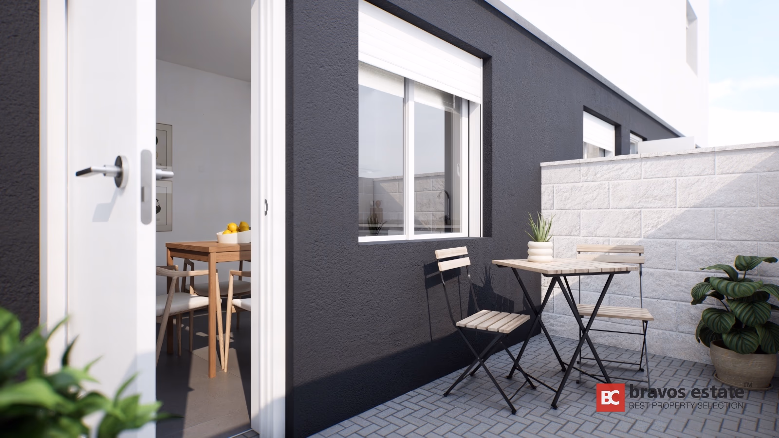 Private terrace with folding outdoor furniture set and dark textured exterior wall in Gran Alacant