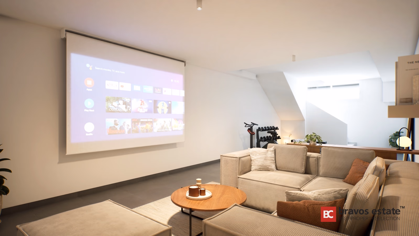 Modern home cinema room with wall-mounted projector screen and beige sectional sofa in Gran Alacant