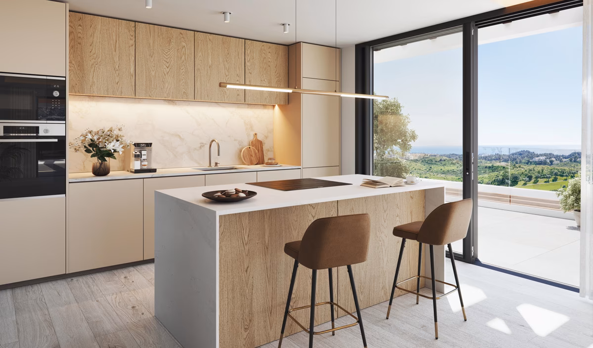 Fitted kitchen with island and sea-view window
