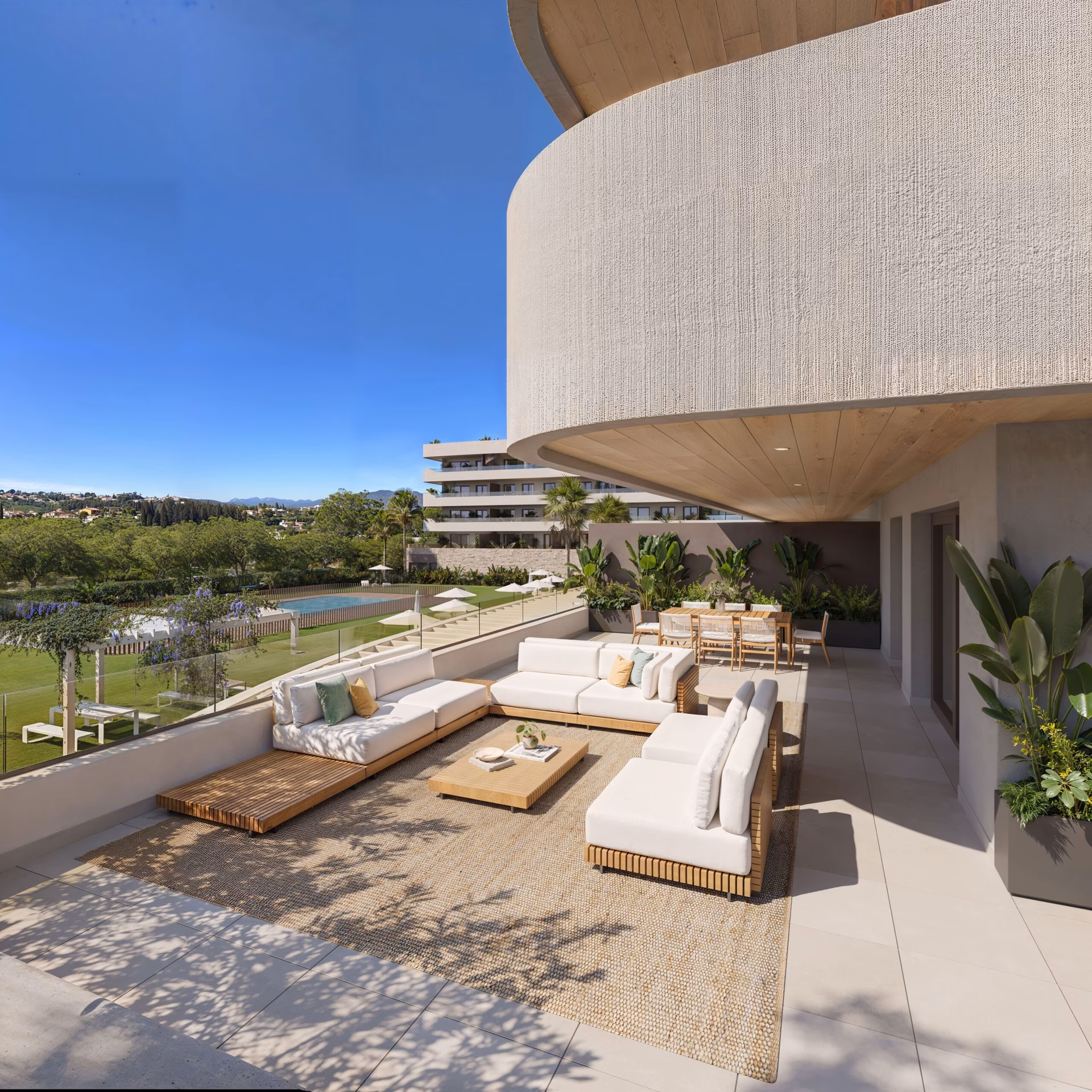 Coin repas extérieur sur la terrasse-jardin du rez-de-chaussée