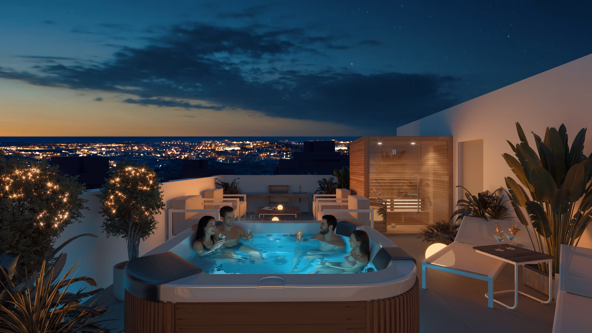 Jacuzzi y sauna en la azotea de noche con las luces de Torrevieja al fondo
