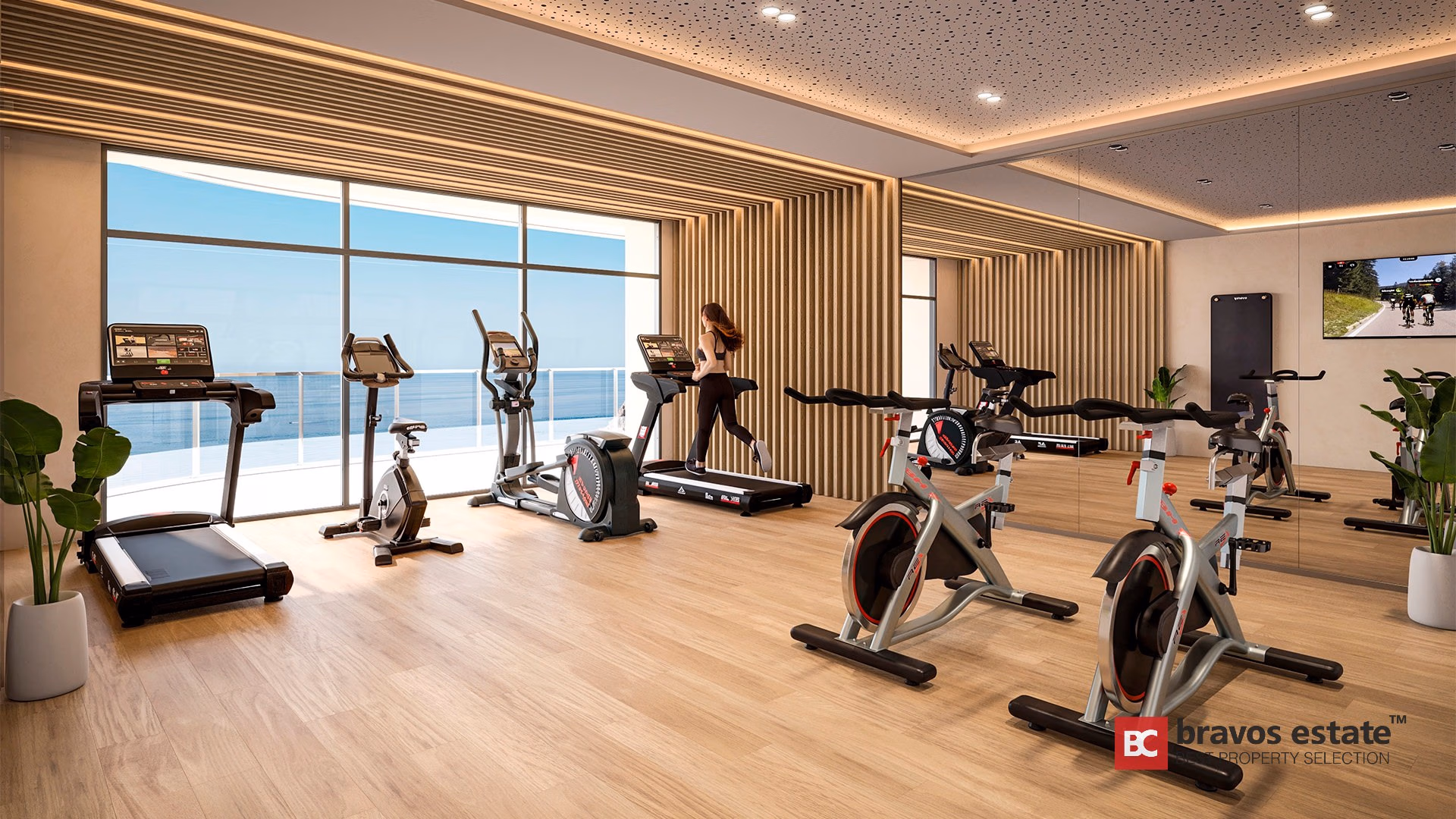 CGI render of TM Tower gym with spin bikes, treadmills, slatted wood accent wall and sea views
