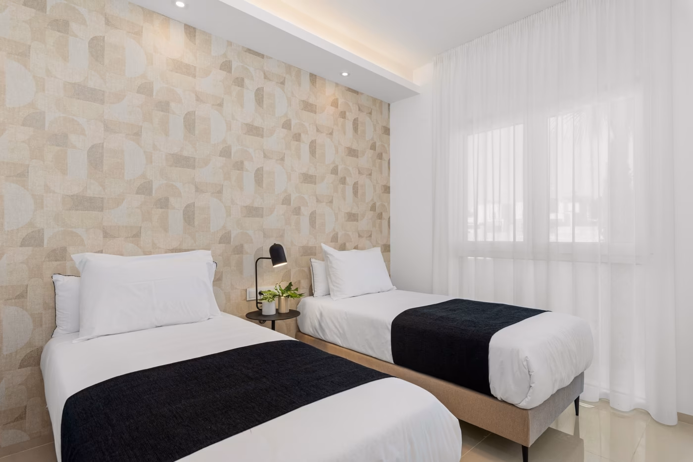 Second bedroom with two single beds