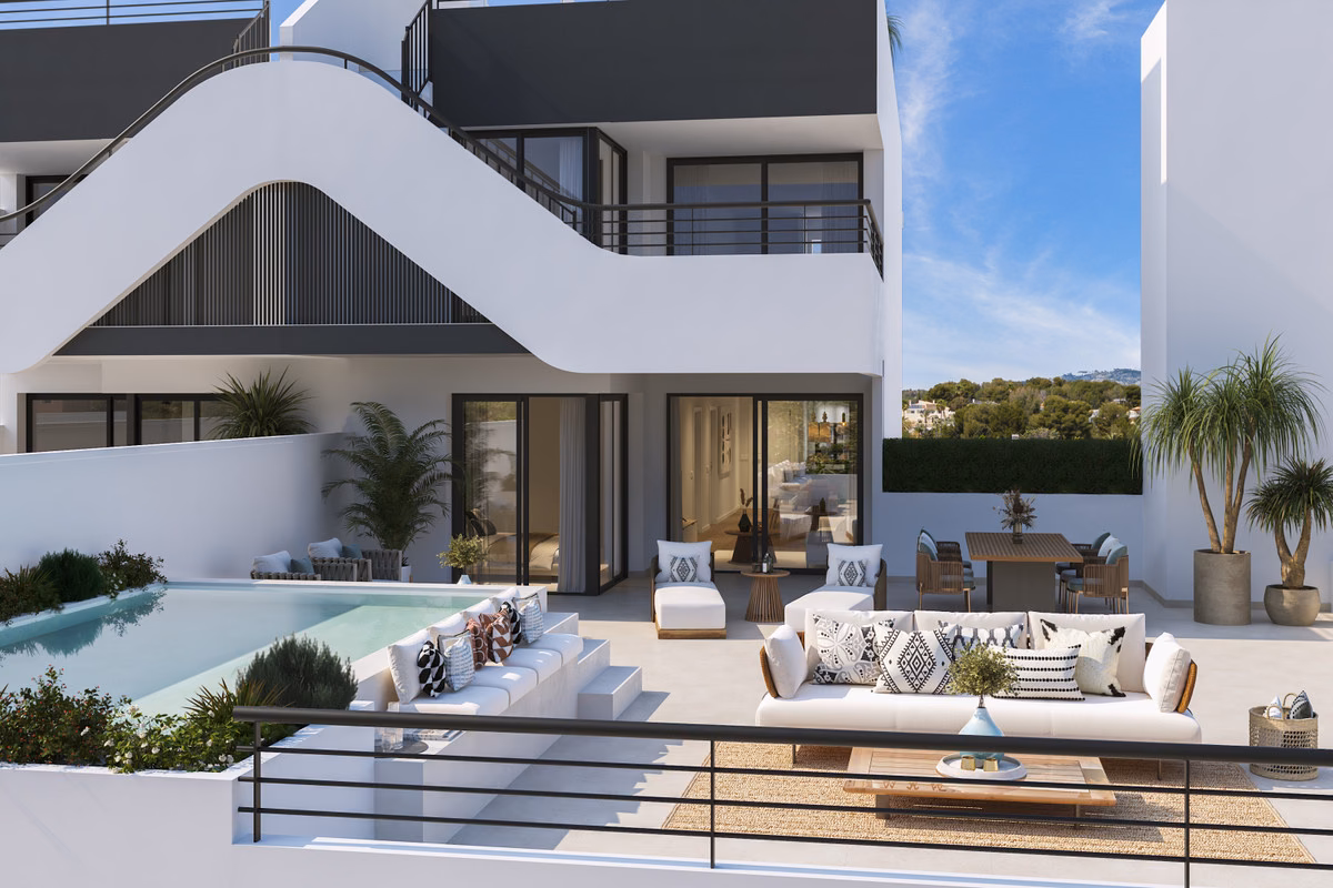 Private garden terrace with lounge seating at a ground-floor Alfaz Essence apartment