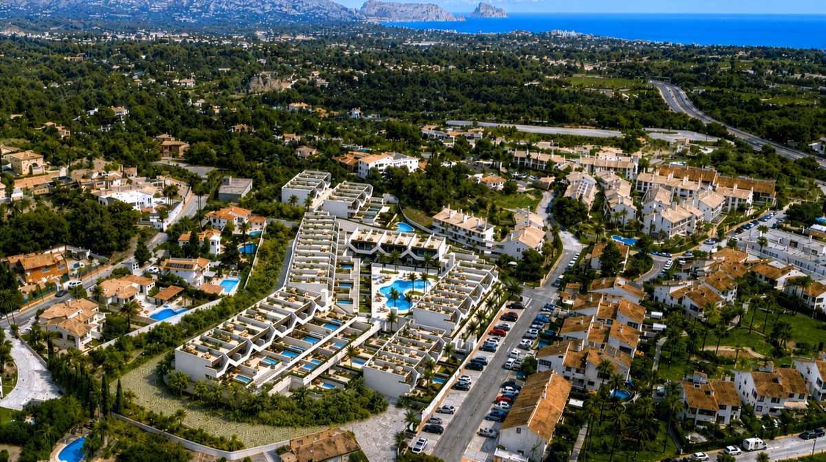 Aerial view over L'Alfàs del Pi with Alfaz Essence in the foreground