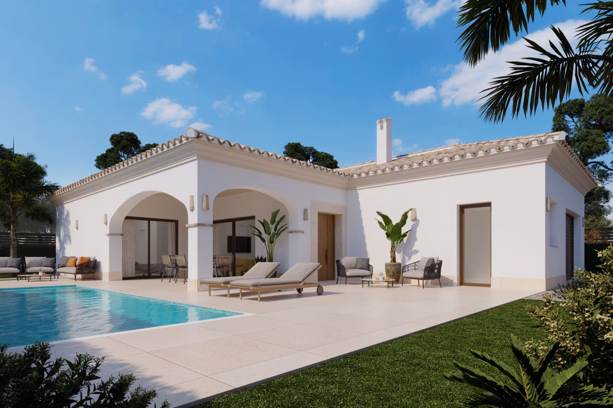 Corner of the villa with pool, lawn and palm trees