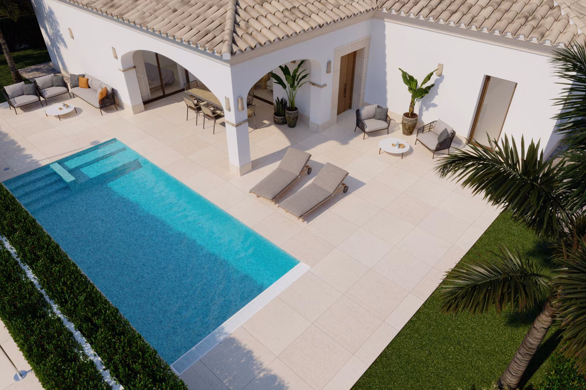 Pool from above with loungers along the edge