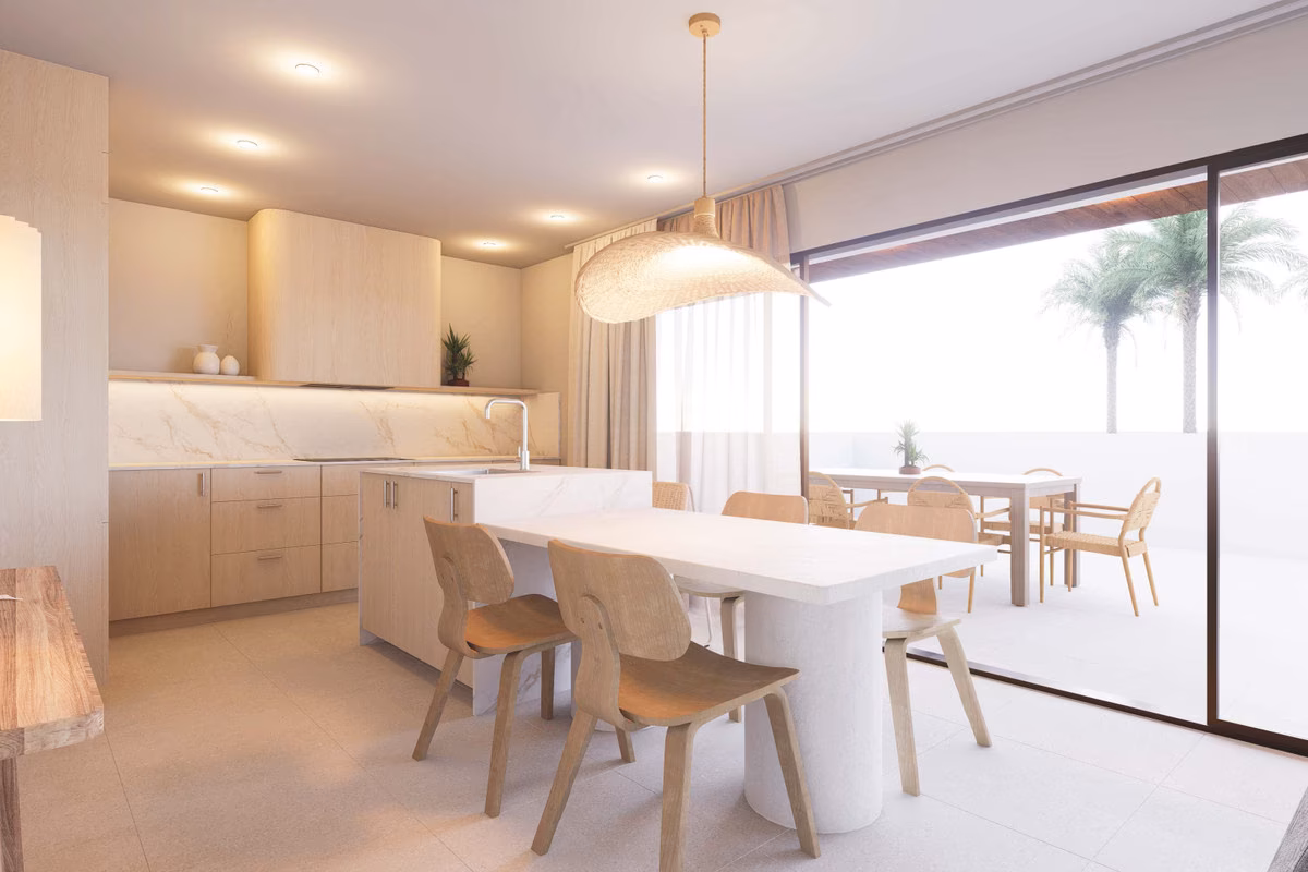 Kitchen and dining area with a glass door to the outside