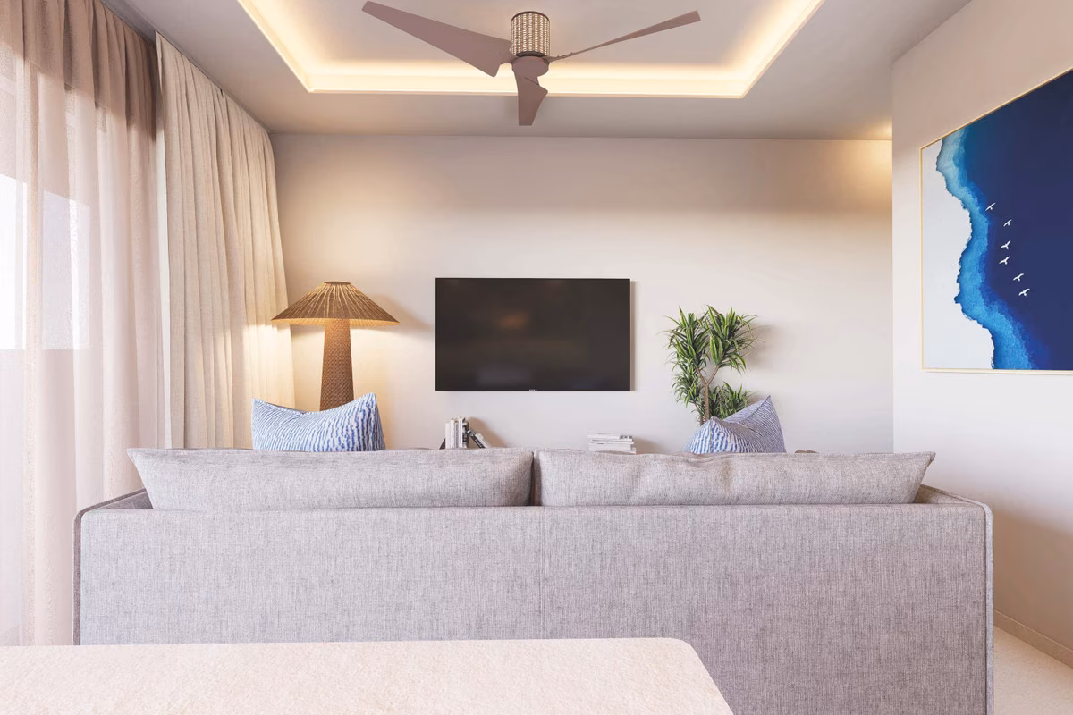 Living room with a sofa and wall-mounted TV