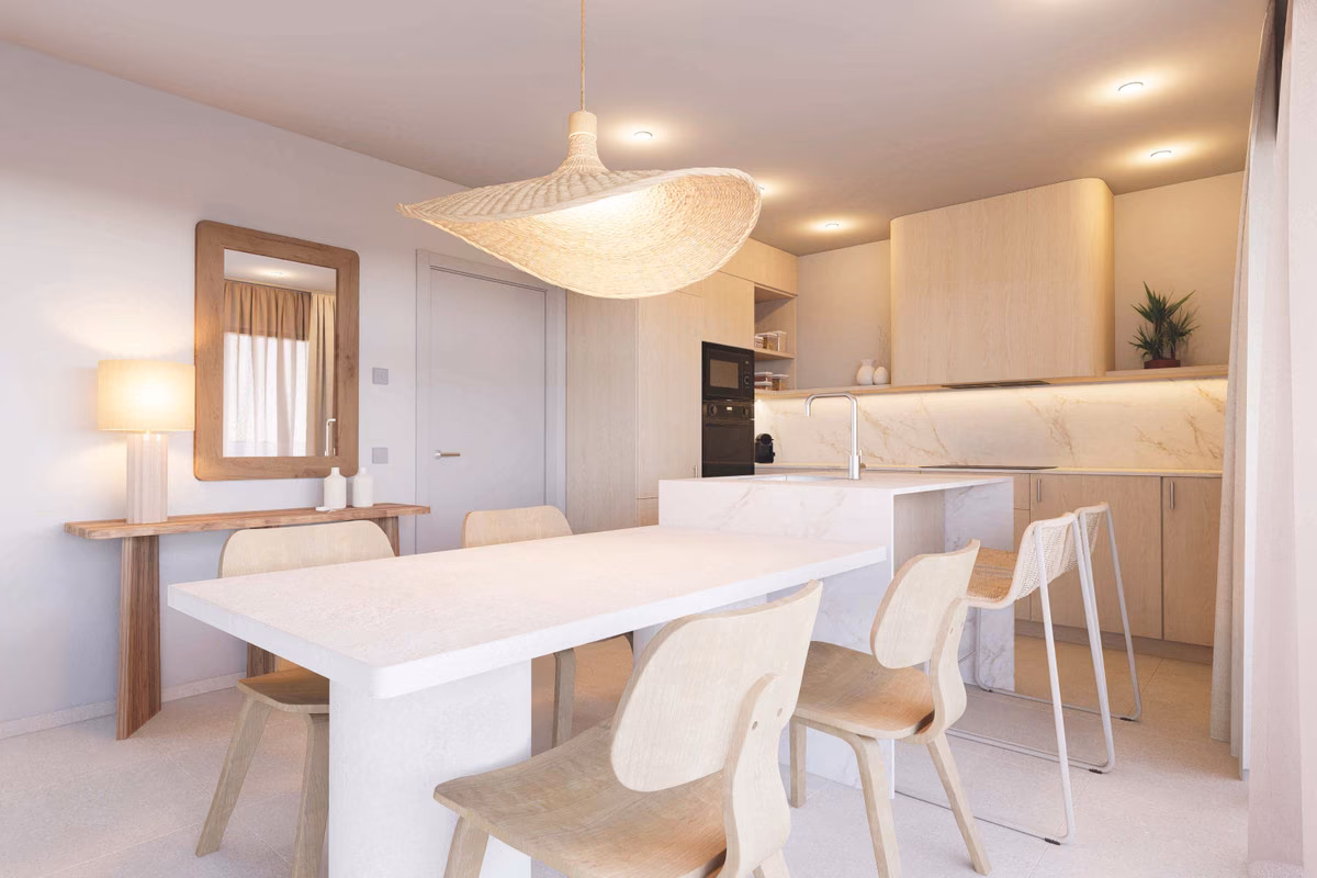 Dining table in front of the kitchen island