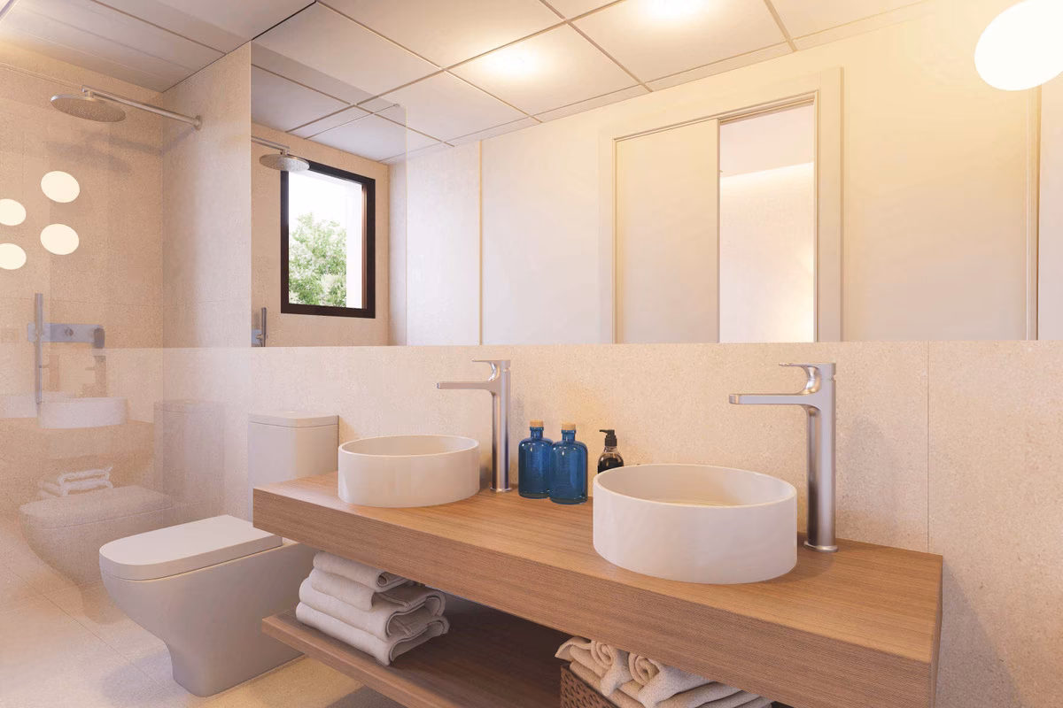 Bathroom with twin vessel basins on a wooden counter