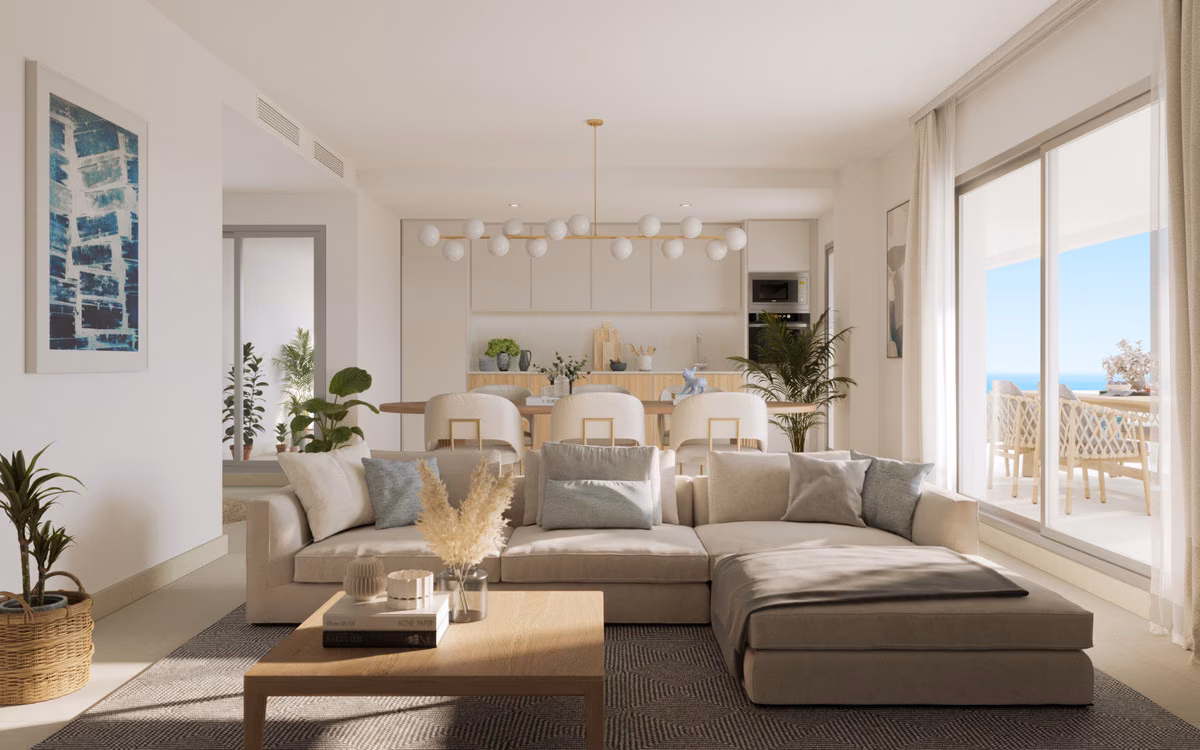 Woonkamer met bank en toegang tot het terras in een appartement van Almare