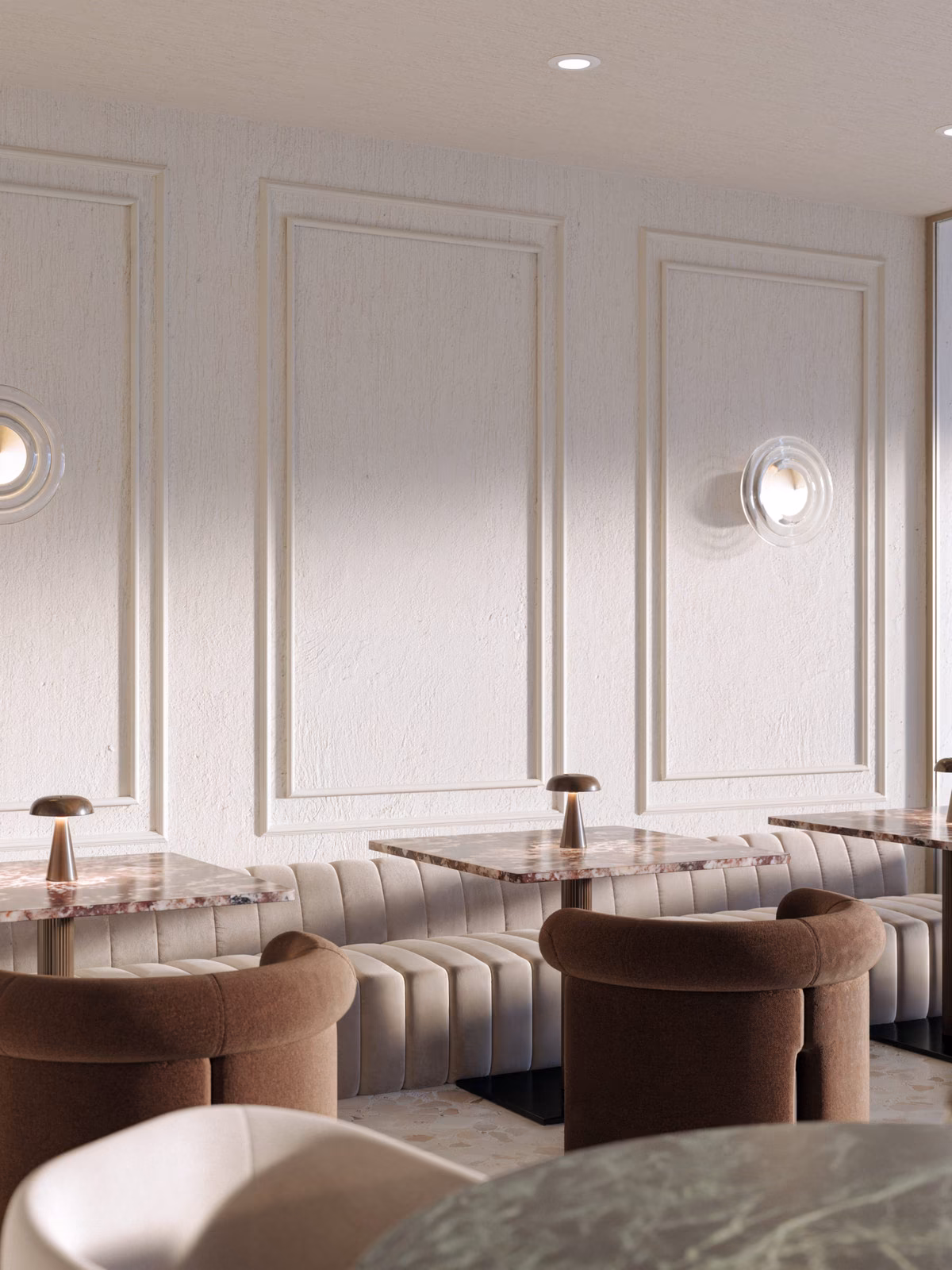 Lounge corner with panelled walls and marble tables