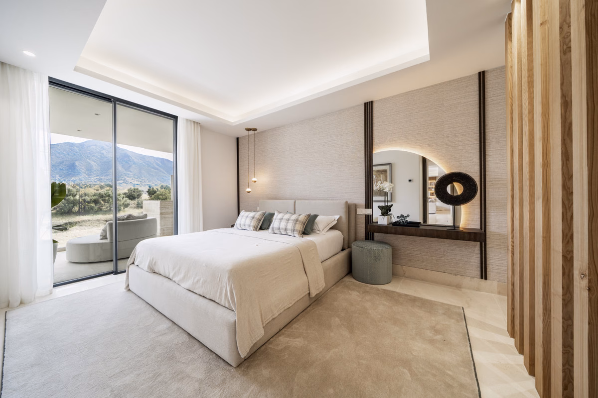 Bedroom with mountain outlook in an Aloha Forest apartment