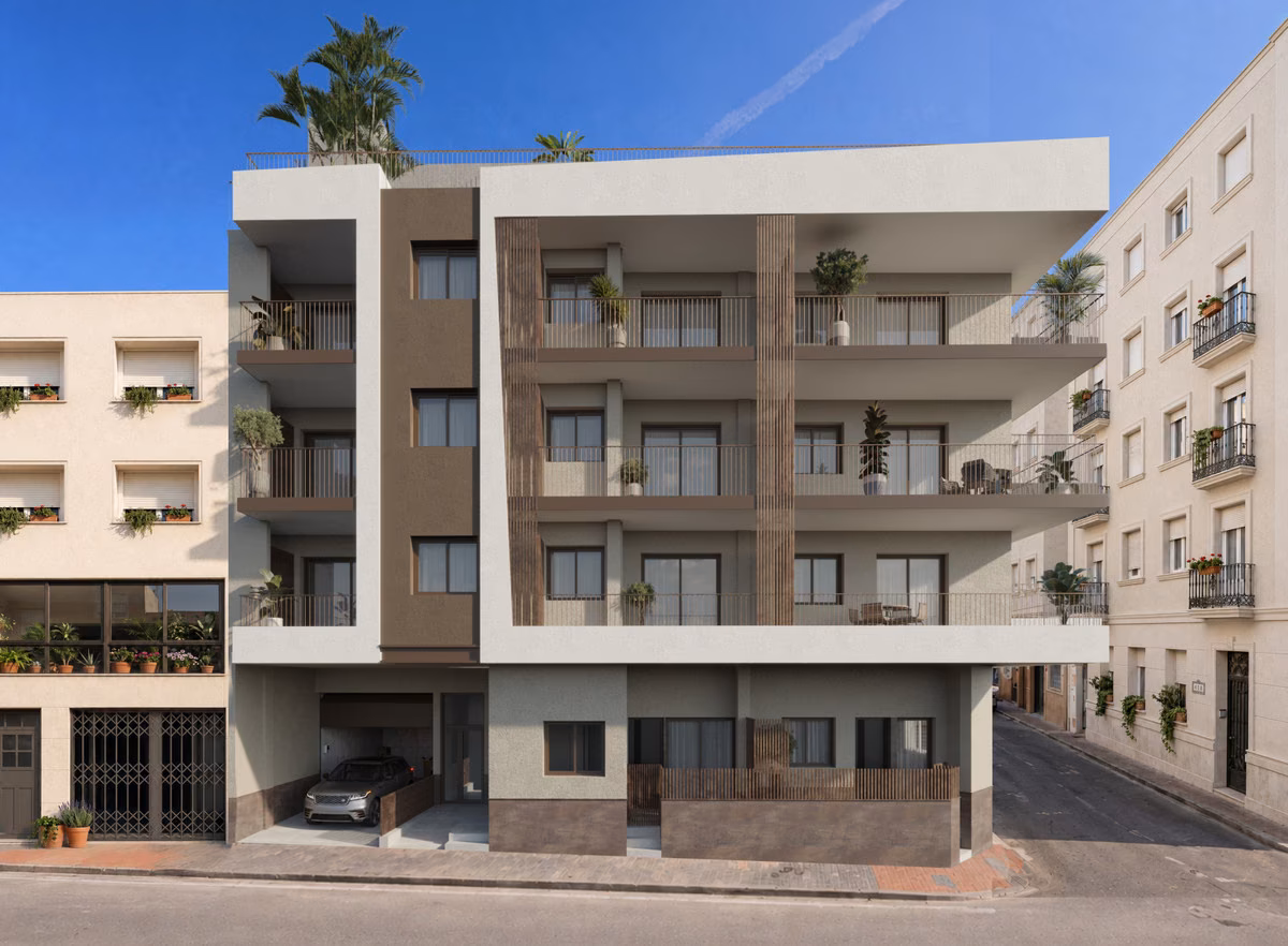 Street facade of Amber Sun with terraces and garage entrance, Santa Pola