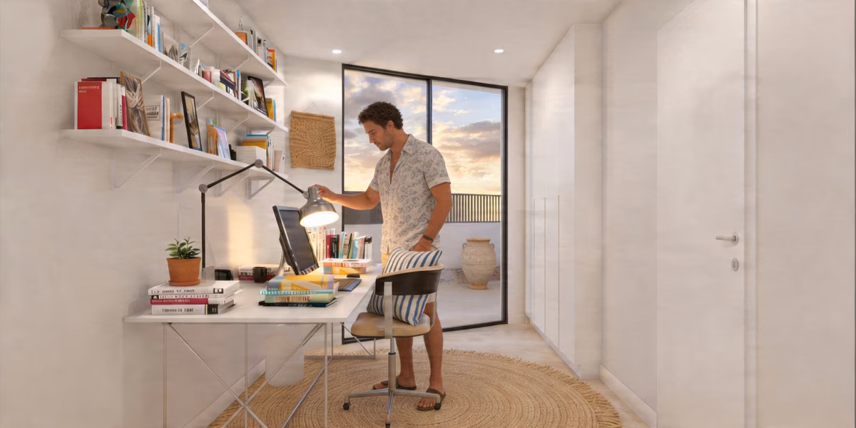 Chambre aménagée en bureau avec table de travail et étagères