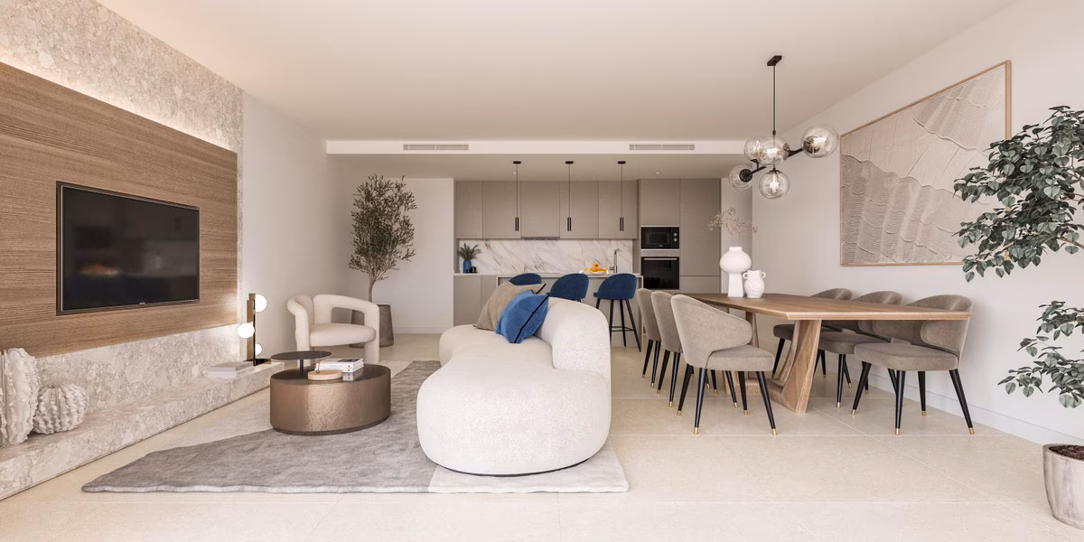 Open-plan living and dining area with kitchen in a Capri apartment