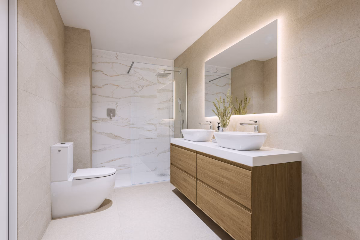 Bathroom with double vanity and large mirror at Capri, Estepona