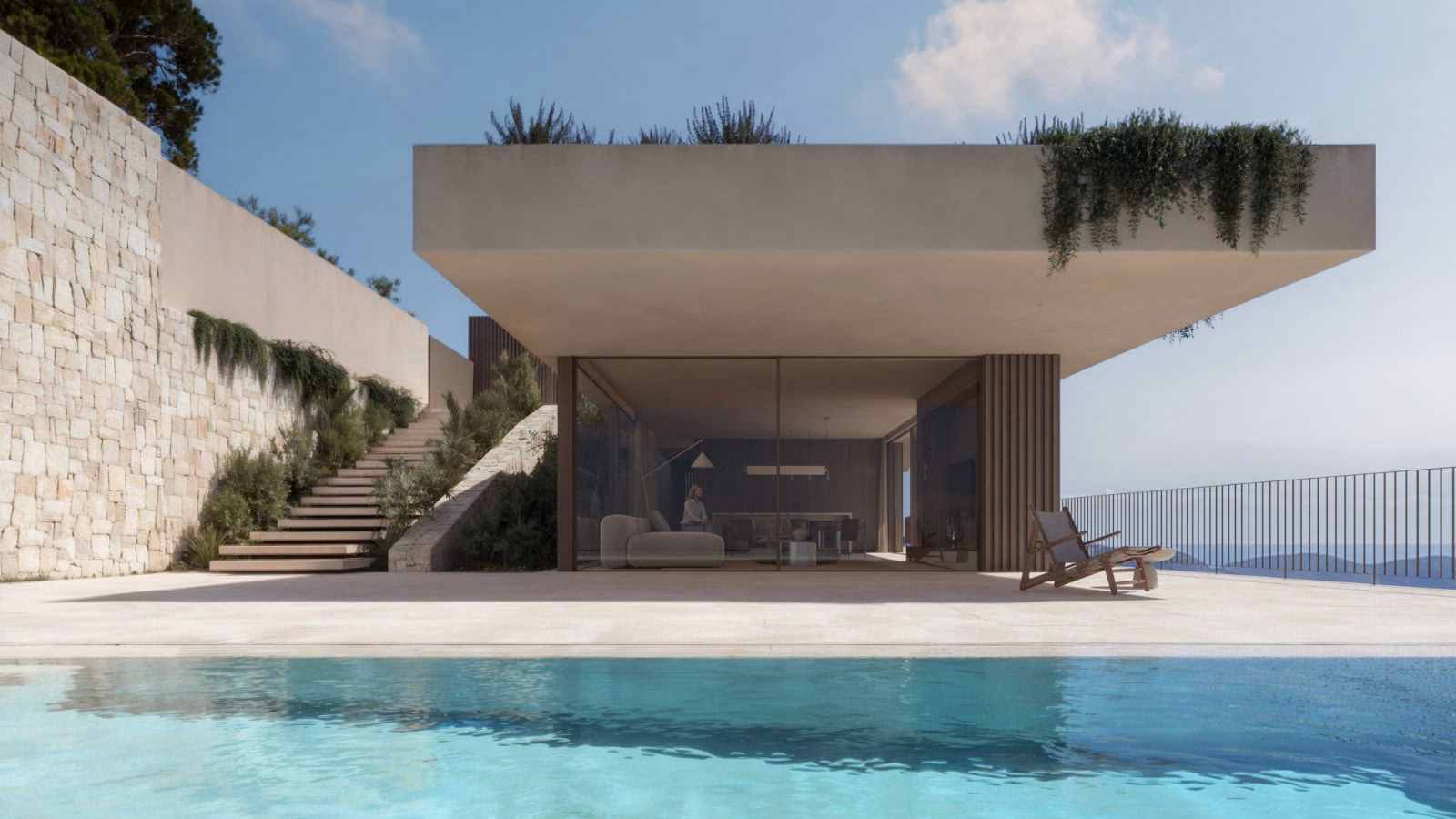 Infinity pool in front of the glazed lower-level living area, with a stone retaining wall and steps