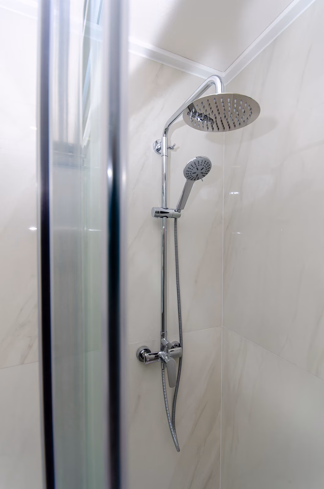 Walk-in shower with rain shower head