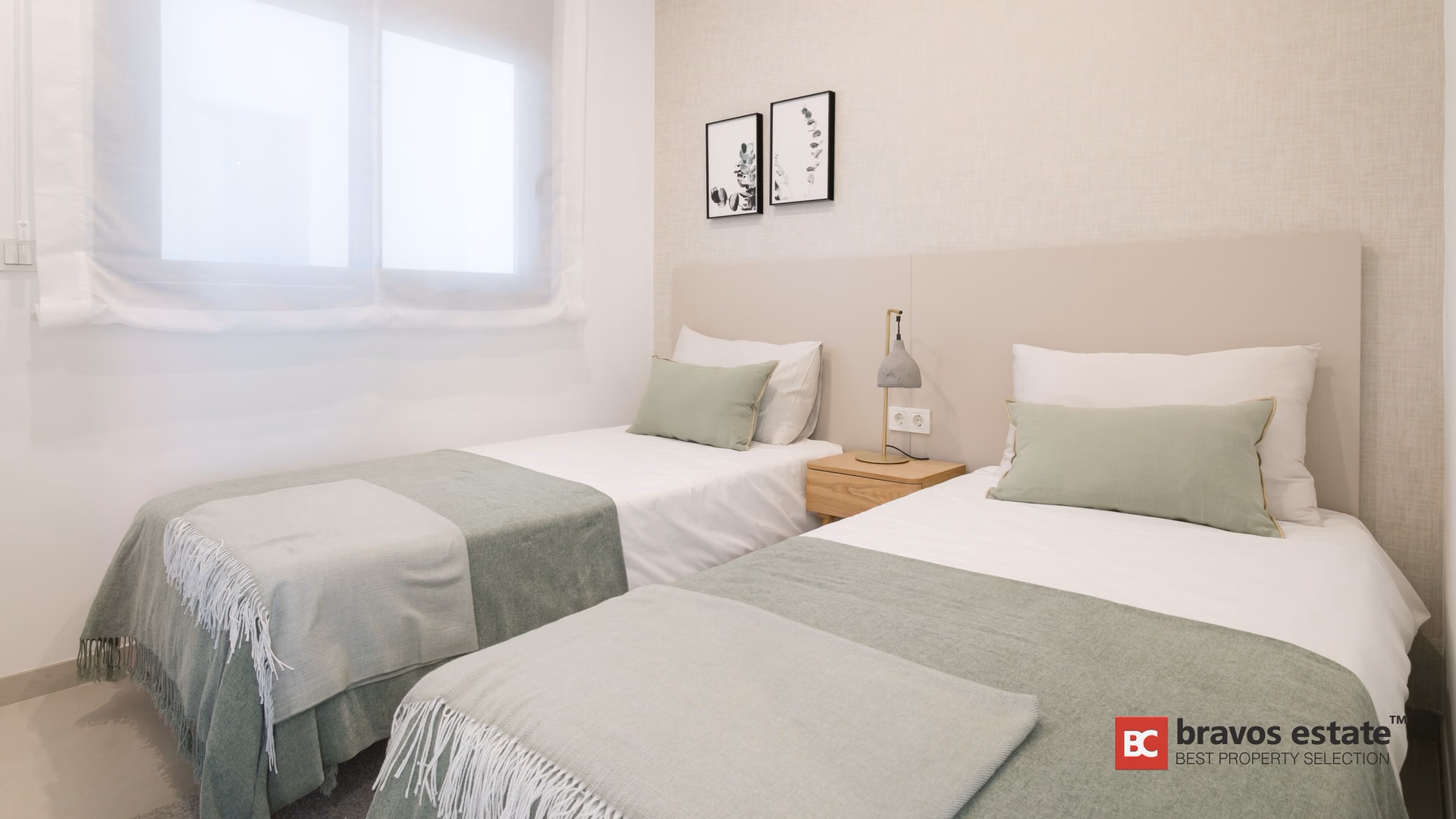 Chambre à deux lits de l’appartement témoin