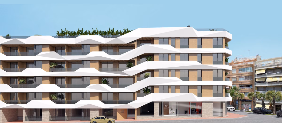 Fassade mit wellenförmigen weißen Balkonen