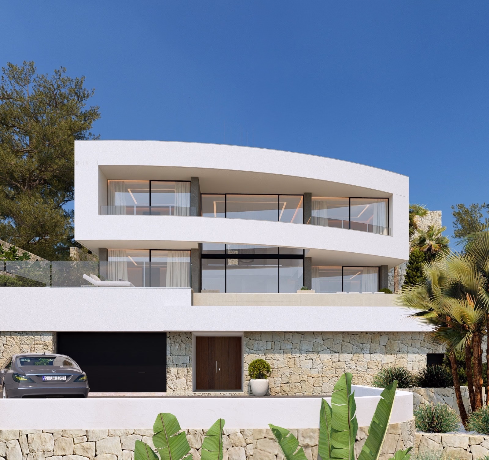 Street side of the villa with the garage door and a parked car