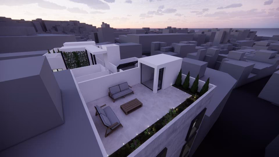 Dachterrasse mit Outdoor-Sofa über den Dächern der Stadt