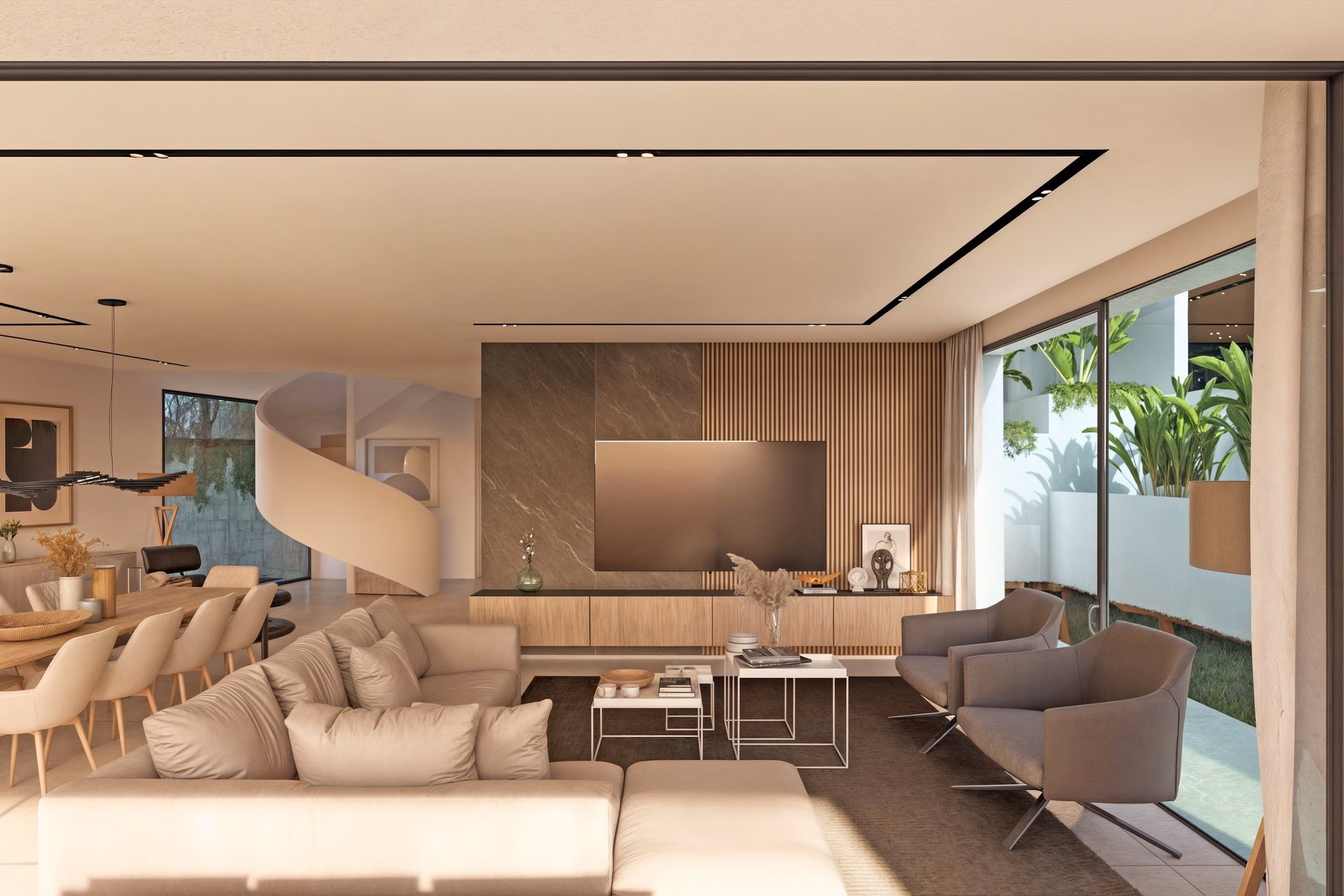 Wohnzimmer mit Sofa und Sesseln, im Hintergrund die Wendeltreppe
