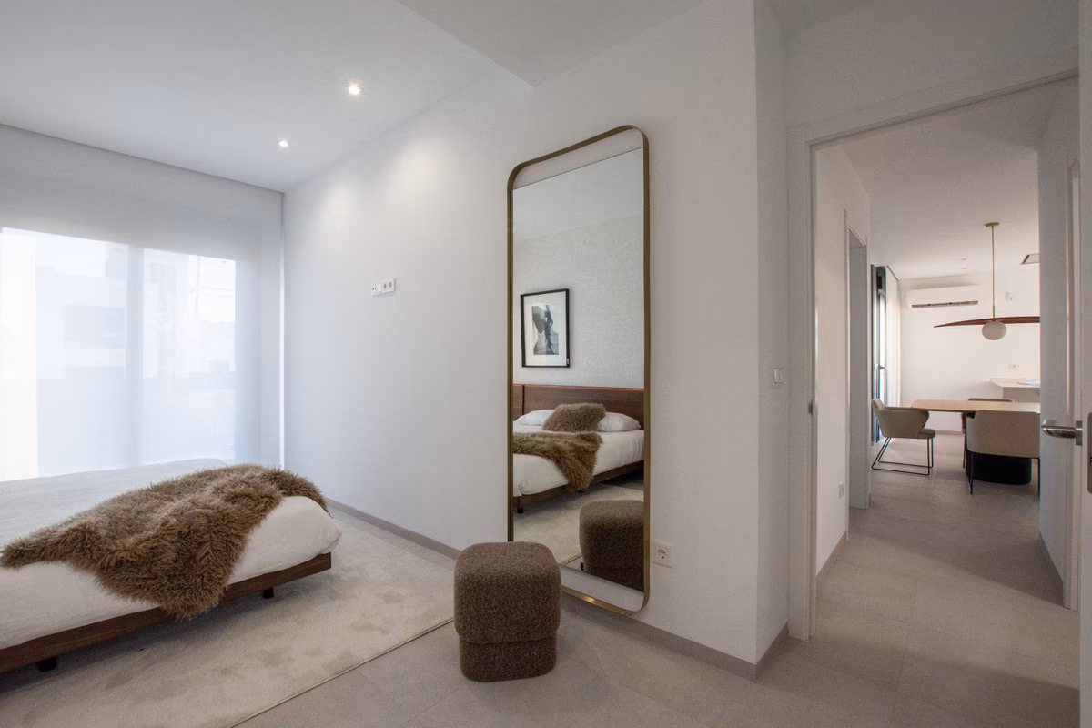 Bright bedroom with bay views