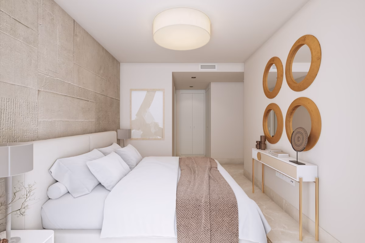 Bedroom with decorative mirrors