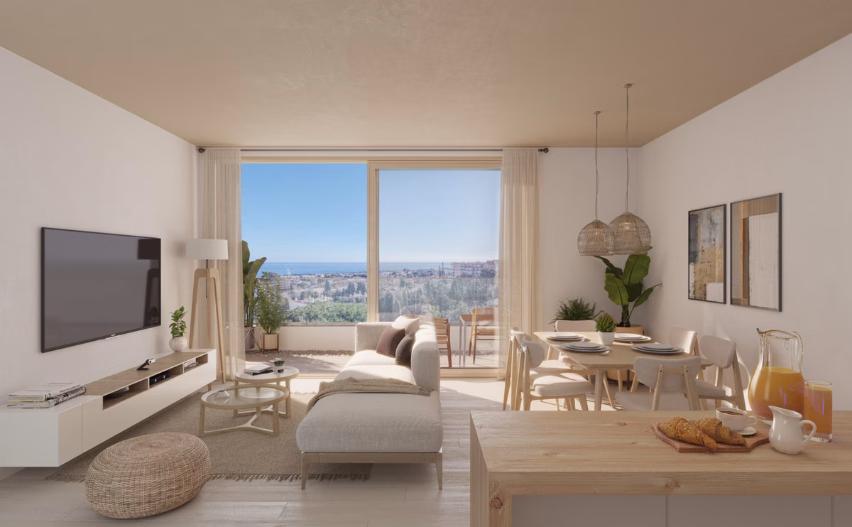 Wohnzimmer mit Sofa und Esstisch, Meerblick durch die Terrassenfenster