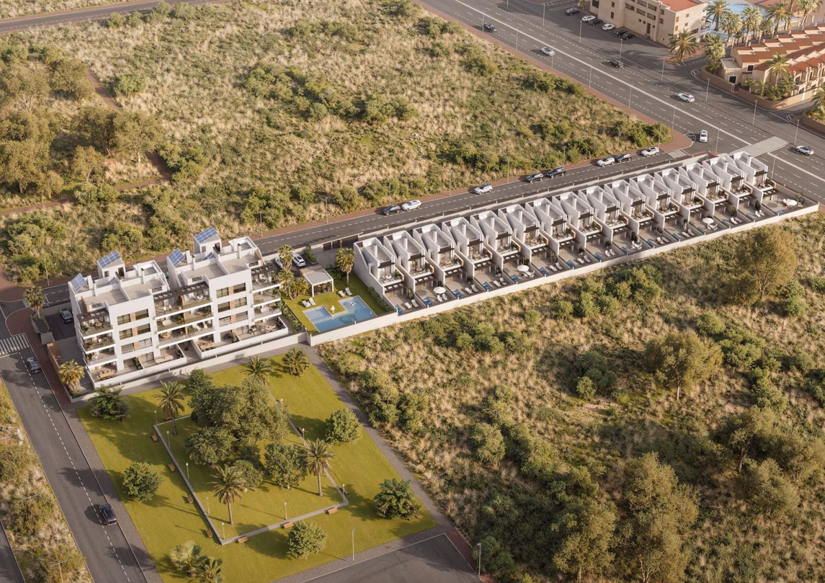 Aerial view of the development with the apartment building, communal pool and villas at La Gomera Star