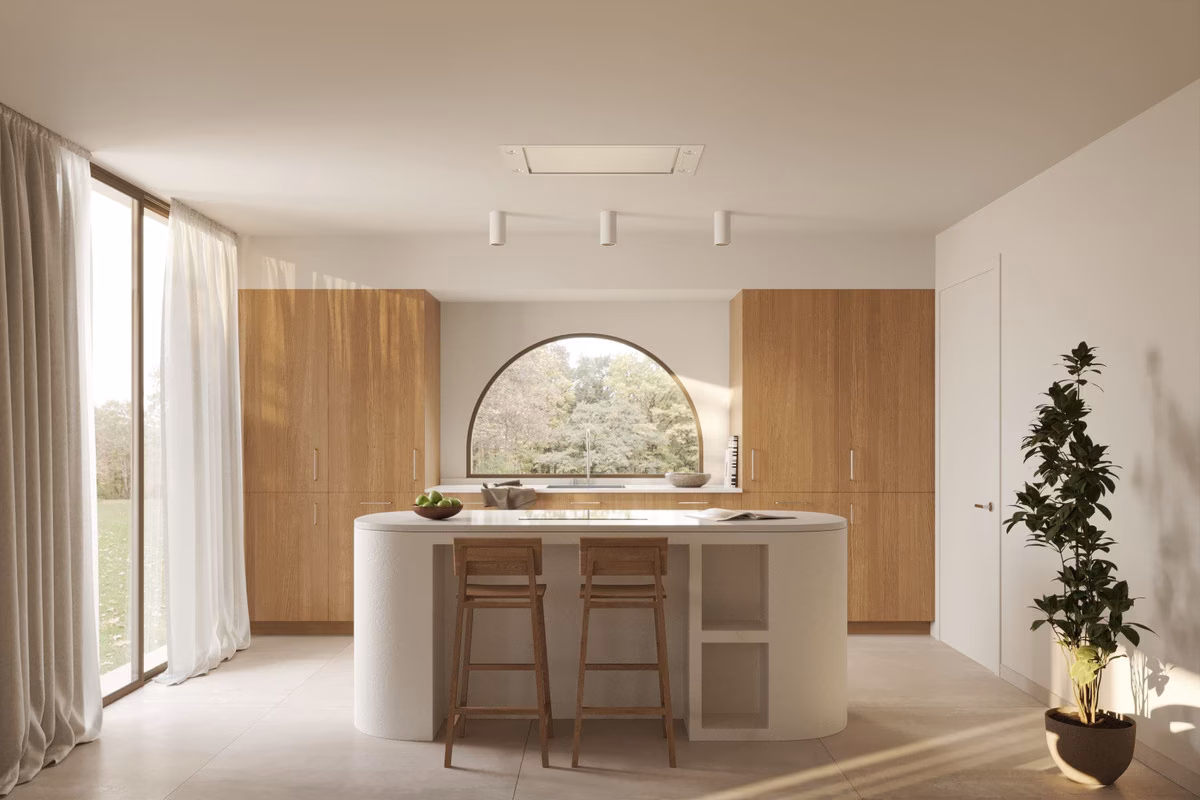 Küche mit Bogenfenster und Kochinsel in einem Haus von Larcosta Homes II, La Finca Golf