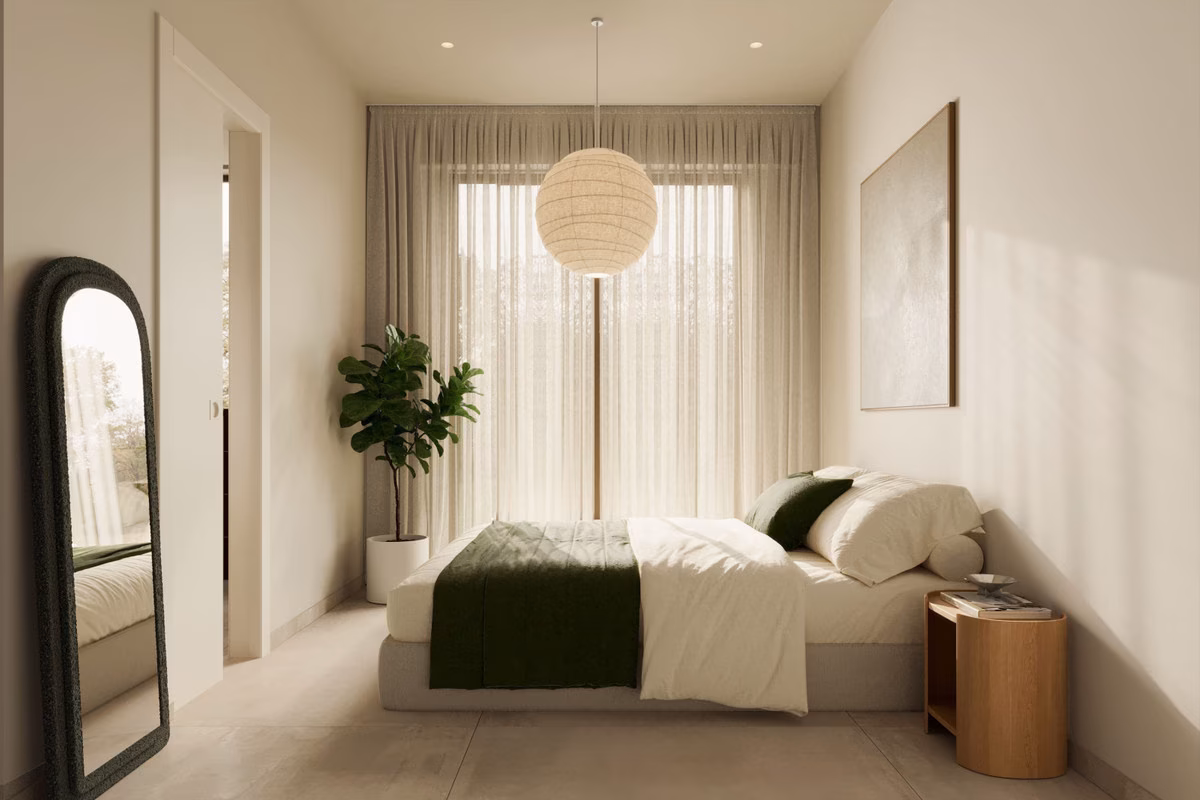 Schlafzimmer mit Pendelleuchte in einem Haus von Larcosta Homes II, La Finca Golf