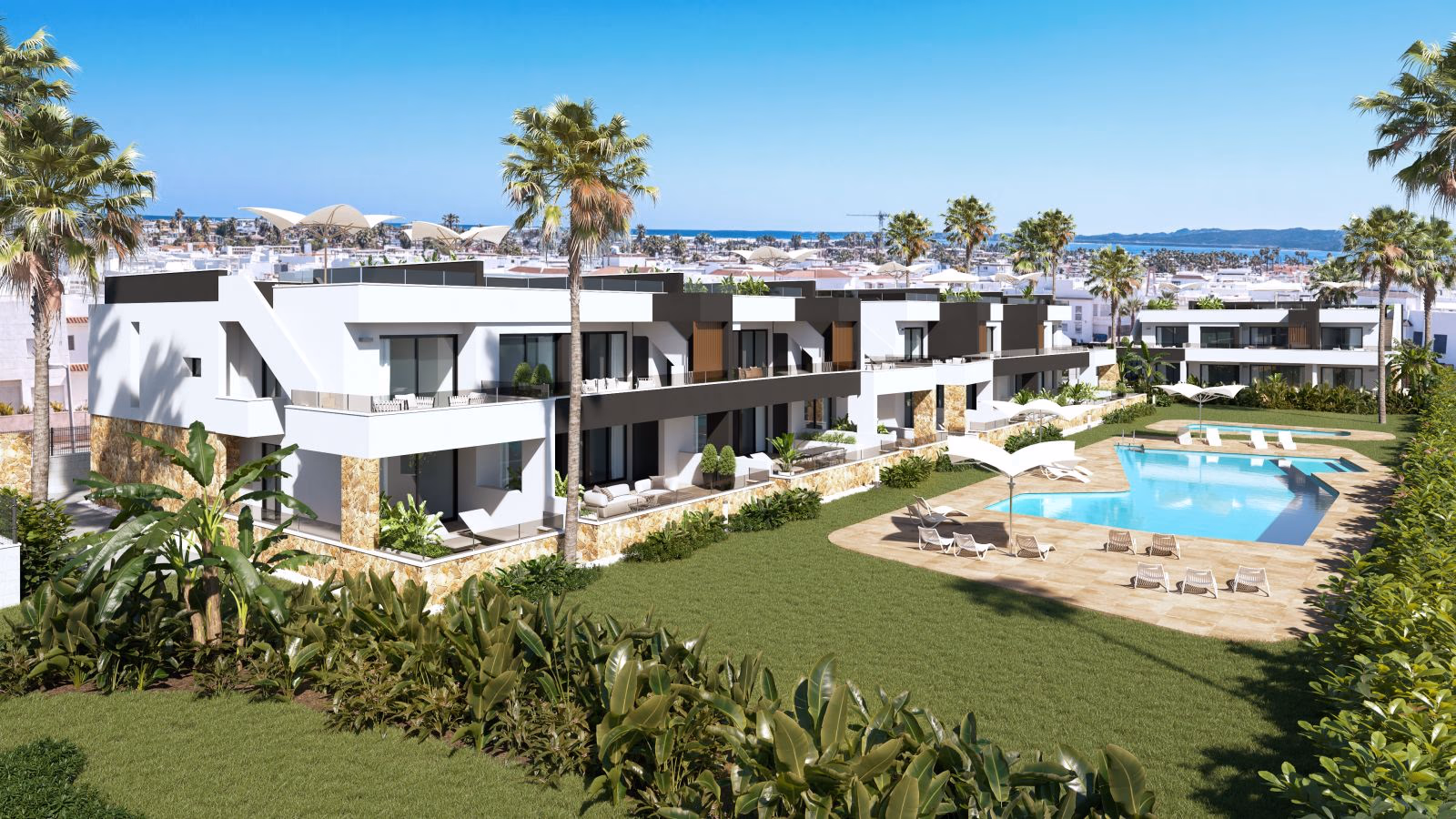 Communal pool and landscaped garden at Lo Marabú