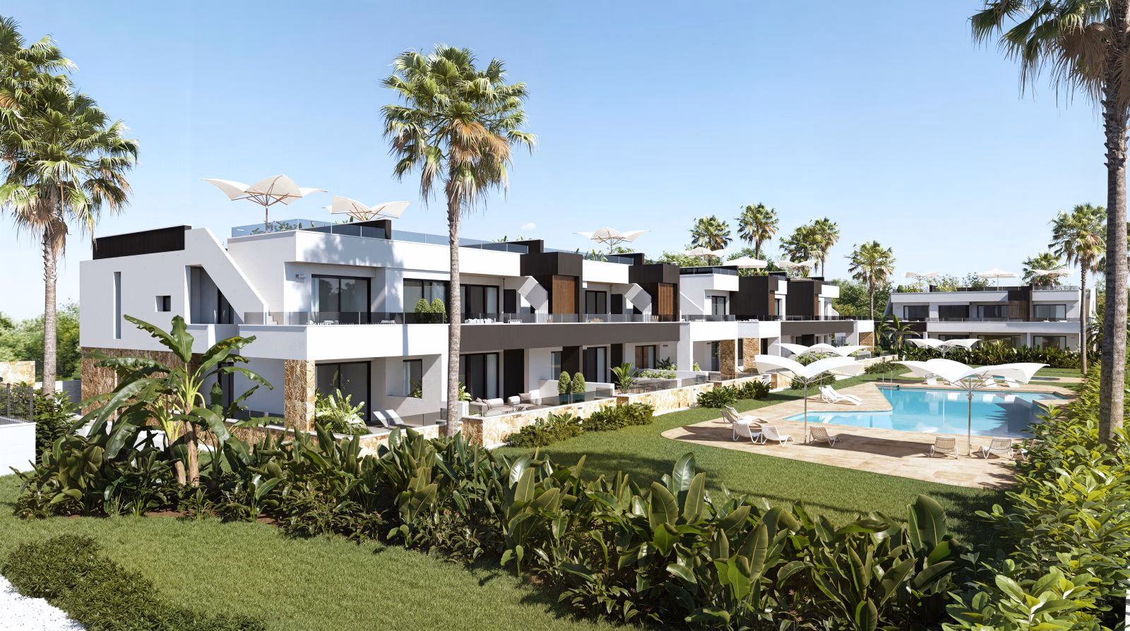 Rows of new-build bungalows beside the pool