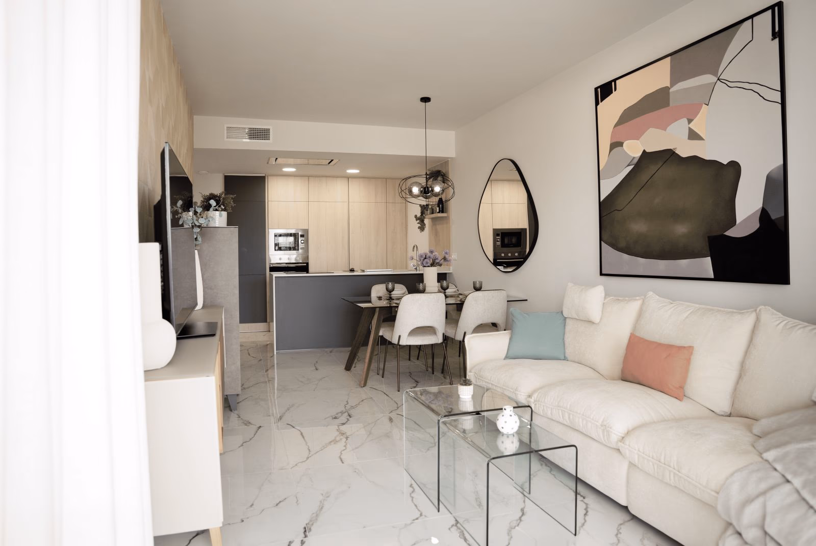 Bright open-plan living-dining room in a Lo Marabú bungalow