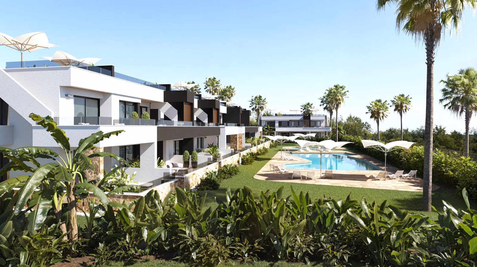Lo Marabú bungalows and pool at dusk