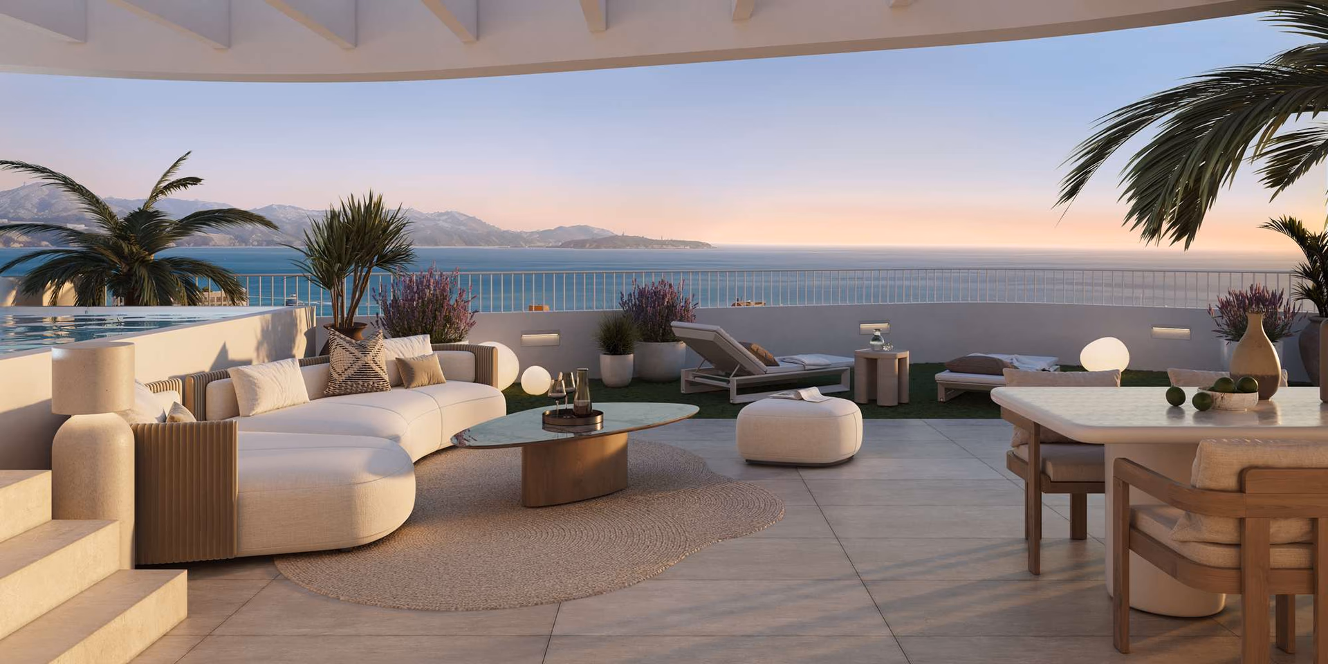 Penthouse-terras met zeezicht en loungestoelen