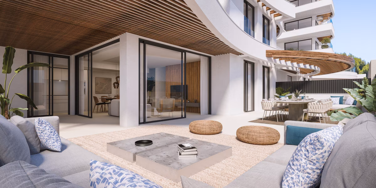 Living room opening onto the terrace at Marina Golden Bay