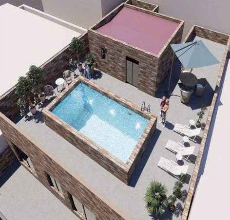 Gemeinschaftspool auf dem Dach mit Sonnenliegen und Schirm bei Maximlux, Torrevieja