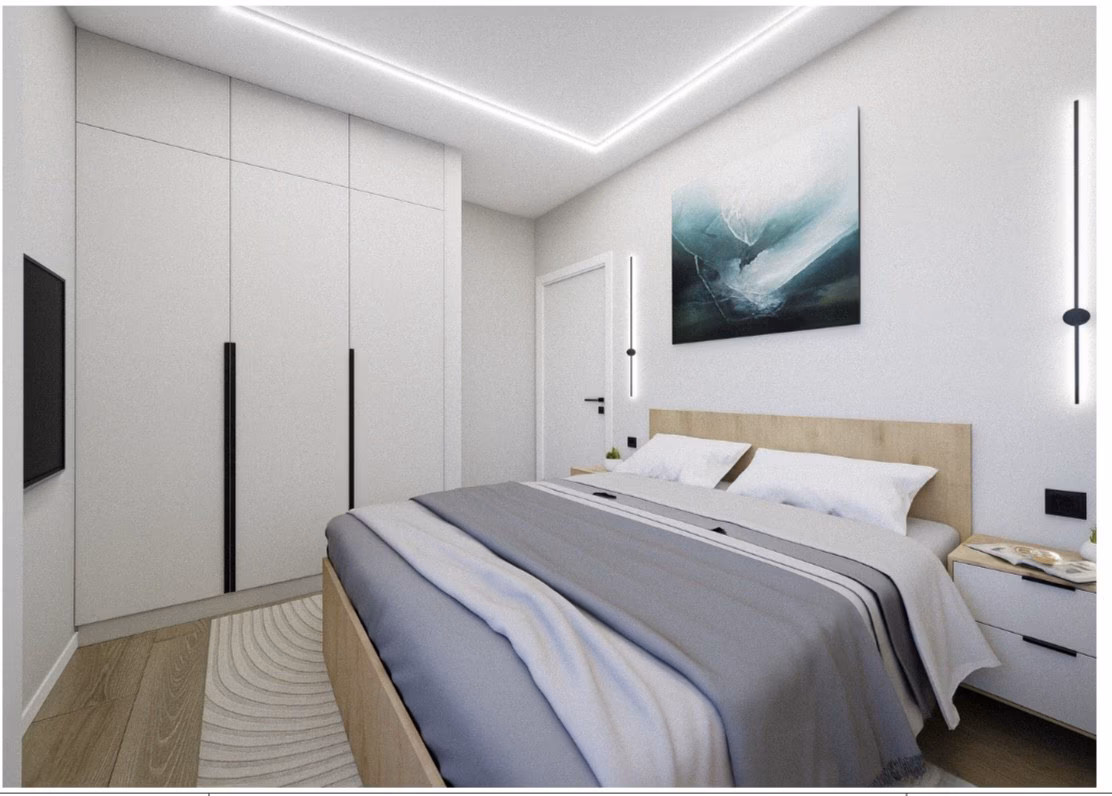 Schlafzimmer mit Einbauschrank und Wandleuchten in einer Wohnung von Maximlux