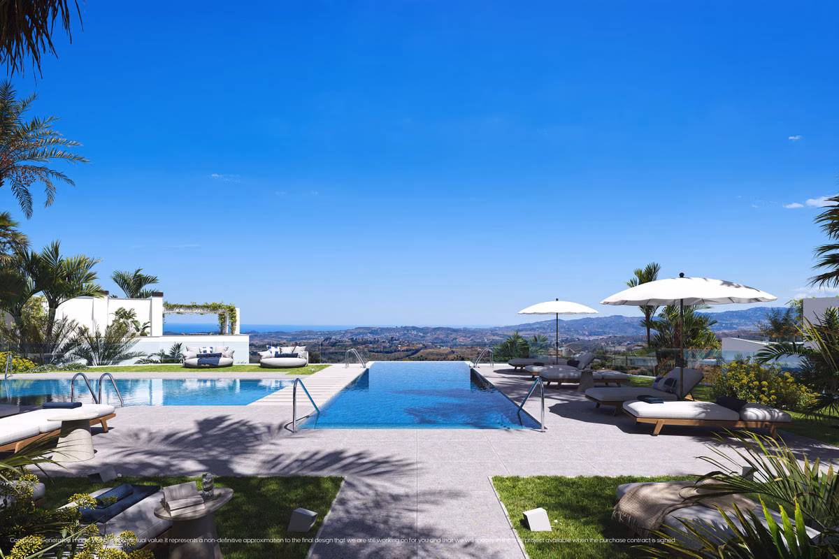 Infinity pool with loungers and parasols overlooking the hills and the sea