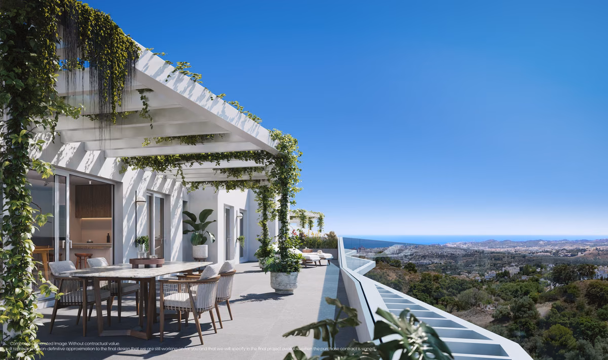 Terrace with pergola, climbing plants and dining table facing the sea